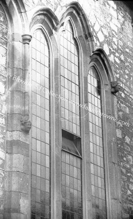 DETAILS OF ST.JOHN'S CHURCH FORMANLY S.J. CORBEL HEADS BETWEEN THE WINDOWS